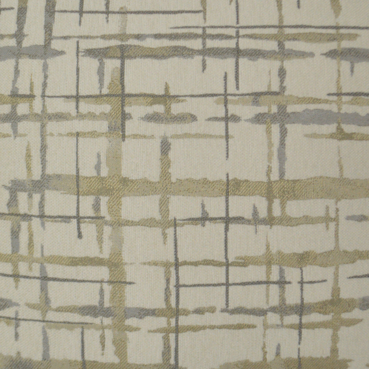 Beige woven fabric with abstract gray and khaki plaid grid pattern.