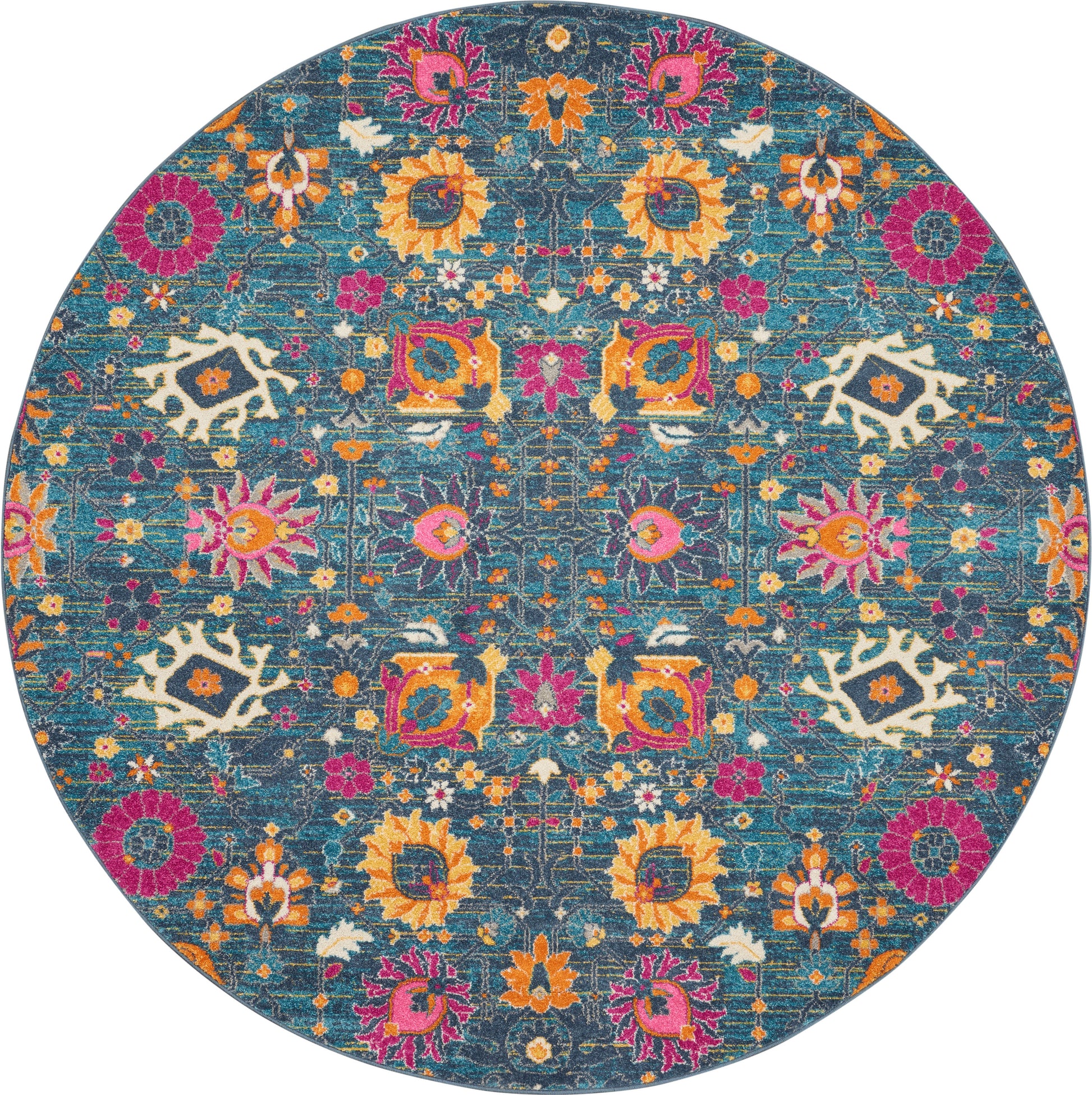 Round teal rug with vibrant multicolor floral pattern; orange, pink & yellow flowers with white accents.