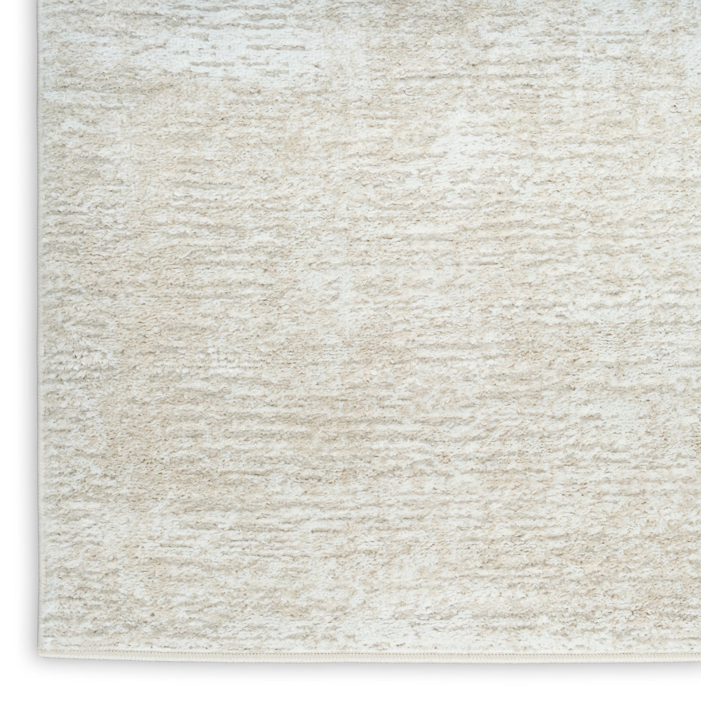 Cream textured shag rug with plush pile; rectangular 4' x 6' size, neutral decor for living room or bedroom.