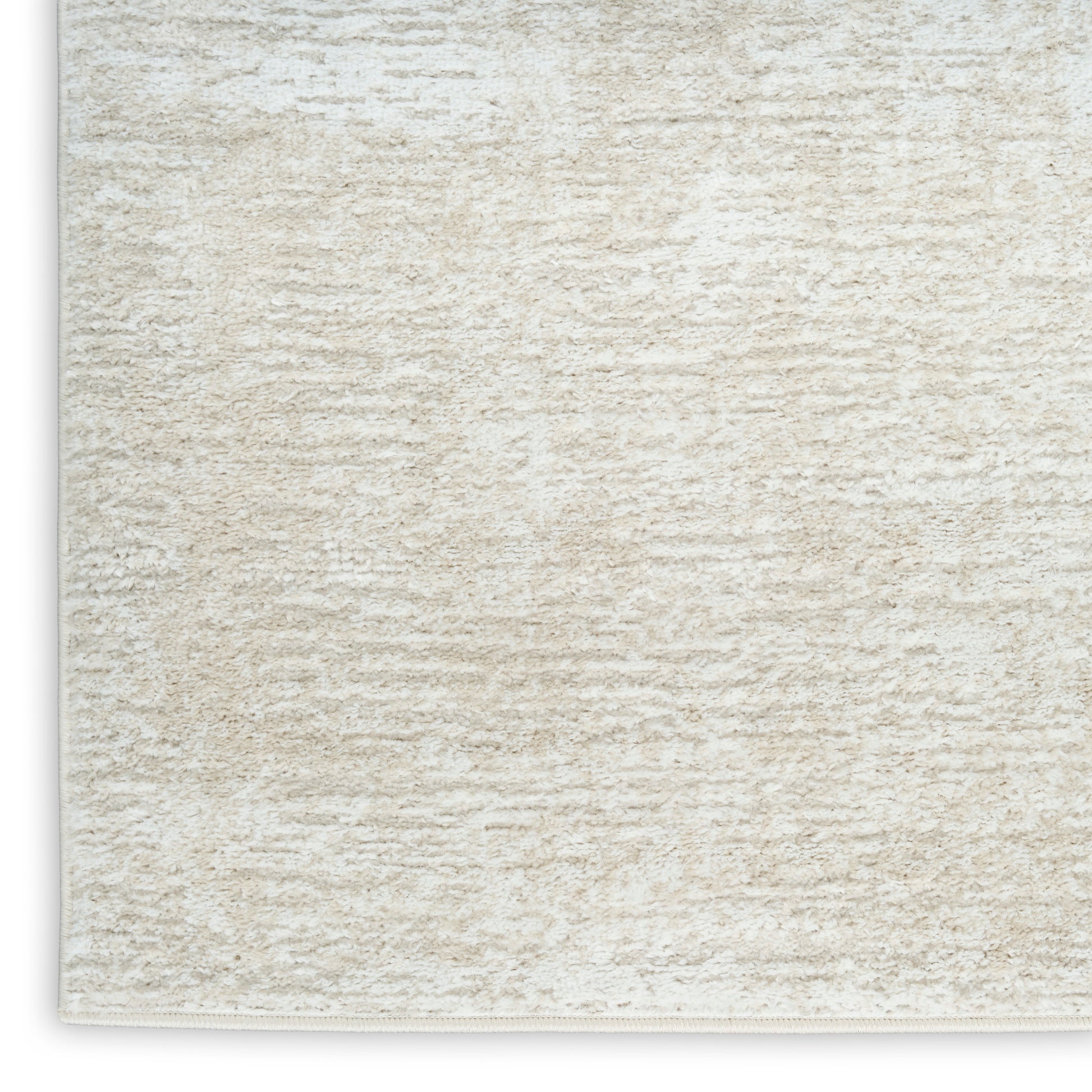 Cream textured shag rug with plush pile; rectangular 4' x 6' size, neutral decor for living room or bedroom.