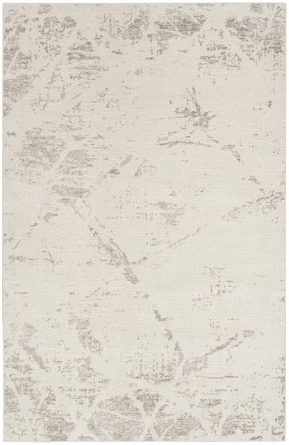 Cream-beige rectangular area rug with a subtle gray distressed damask pattern; soft, low-pile look.