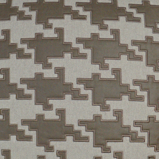 Beige fabric with taupe geometric stepped pattern; interlocking shapes, ideal for upholstery.