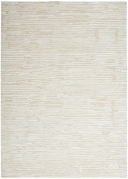 Beige cream area rug with subtle linear pattern and soft plush texture for a modern neutral look.