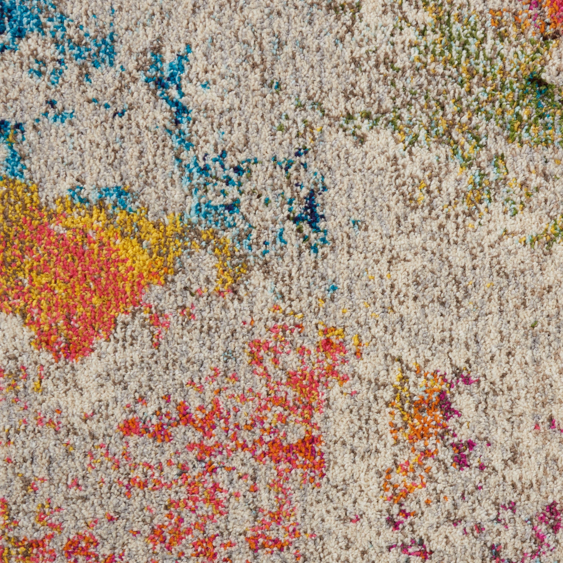 Beige shag rug with vibrant multicolor abstract blotches in blue, yellow, pink, green and orange.