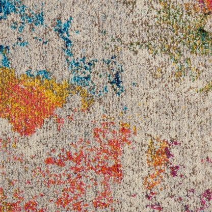 Beige shag rug with vibrant multicolor abstract blotches in blue, yellow, pink, green and orange.