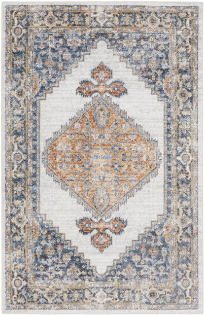 Rectangular oriental area rug with cream field, blue and gray border, and an orange central diamond medallion; vintage distressed motif.