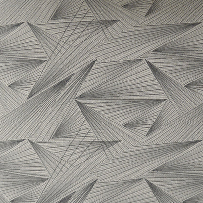 Gray pillow with a stitched triangular geometric pattern; quilted, upholstery-style.
