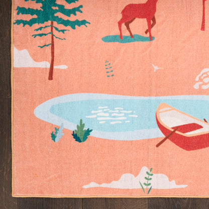 Peach rug with a rustic outdoor scene: teal tree, blue pond, red canoe, orange ground; cozy decor for living spaces.