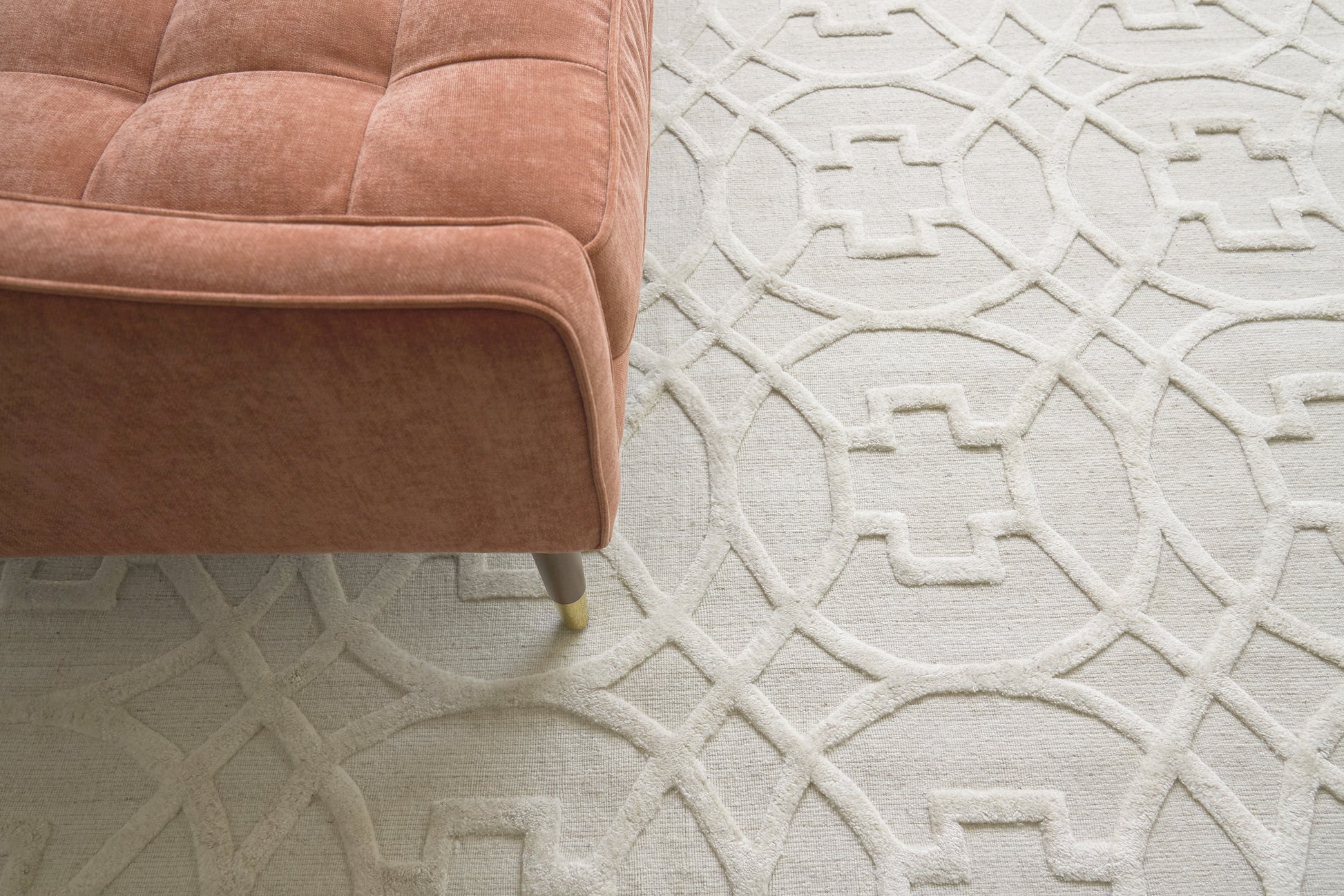 Cream geometric indoor hand-loomed rug, 6' x 9'.