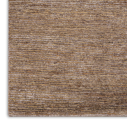 Brown striped textured rug with loop pile in tan & beige tones, close-up corner view.