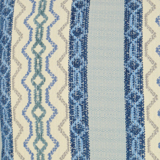 Woven fabric featuring vertical blue stripes and cream geometric patterns; zigzags and diamonds on a light background.
