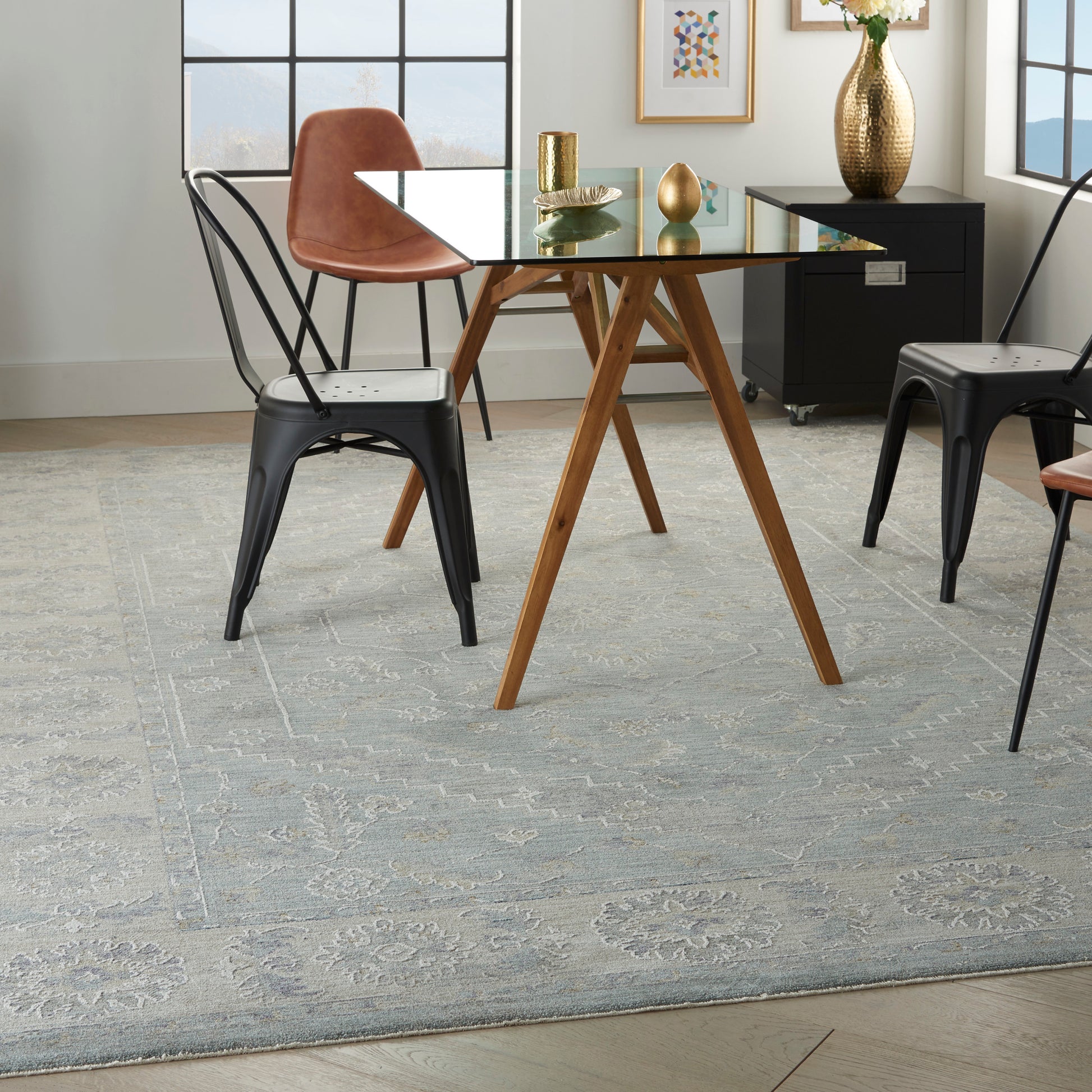 Vintage rug, 8' x 10', laid on the floor in a modern living space.