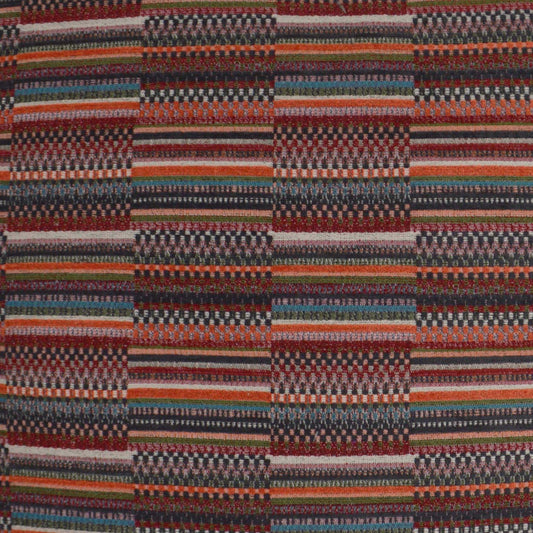Colorful woven striped fabric with orange, red, blue, black and white in a checkered pattern; great for upholstery.