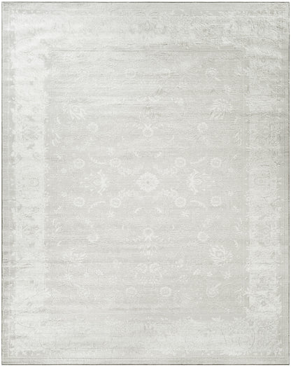 Neutral gray and ivory rectangular rug with a subtle distressed oriental medallion pattern.