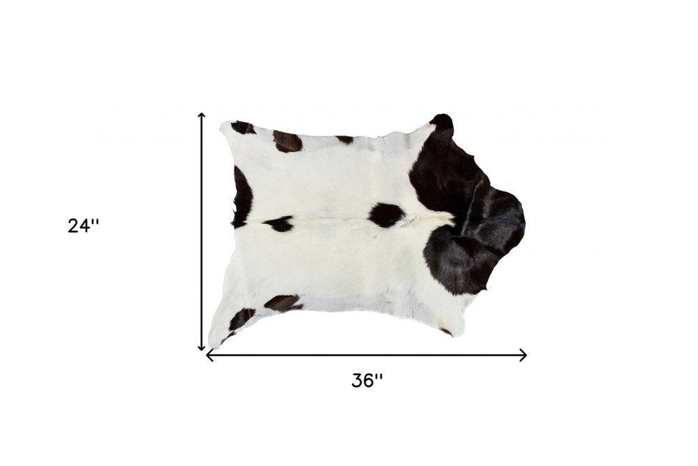 2' X 3' Black And White Cowhide Cowhide Print Hand Woven Area Rug