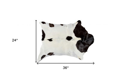 2' X 3' Black And White Cowhide Cowhide Print Hand Woven Area Rug