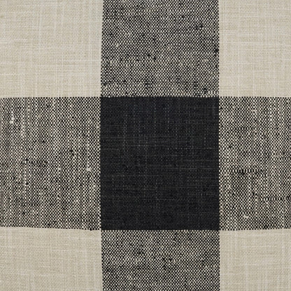 Pillow with a charcoal plaid check pattern on woven fabric.