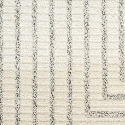 Cream textured rug with light grey vertical stripes and a boxed border corner detail