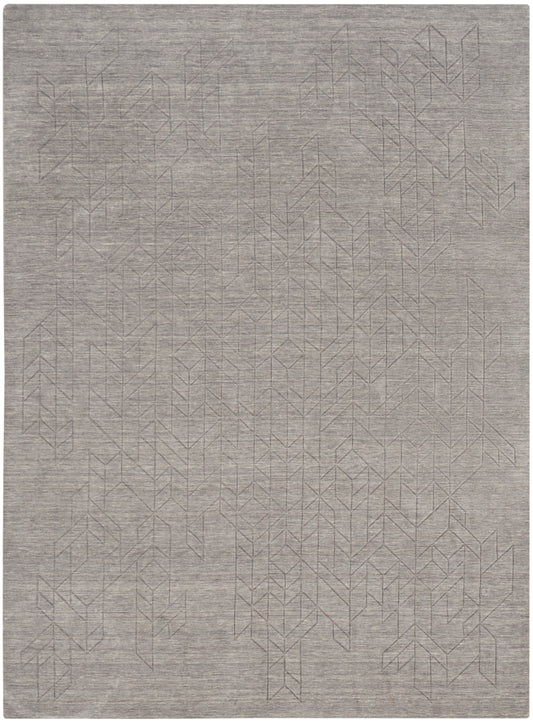 Taupe flat-weave area rug with subtle geometric diamond pattern; modern minimalist home decor