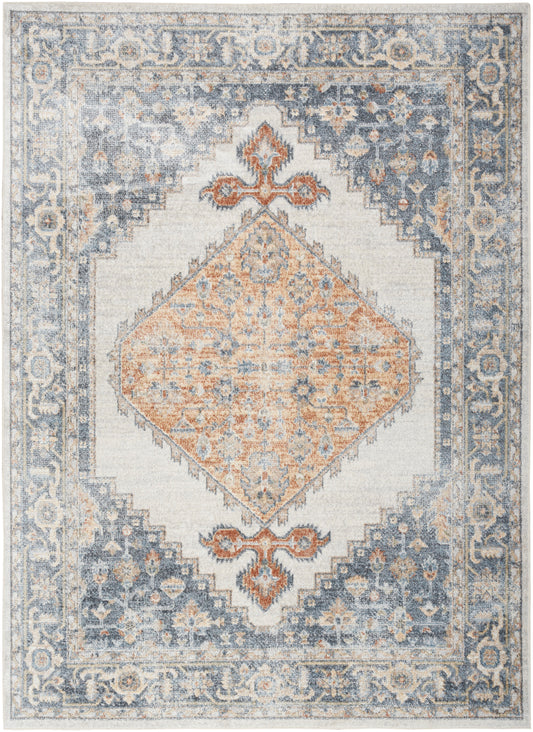Blue-gray Persian-style area rug with ivory field and peach diamond medallion; ornate floral border.