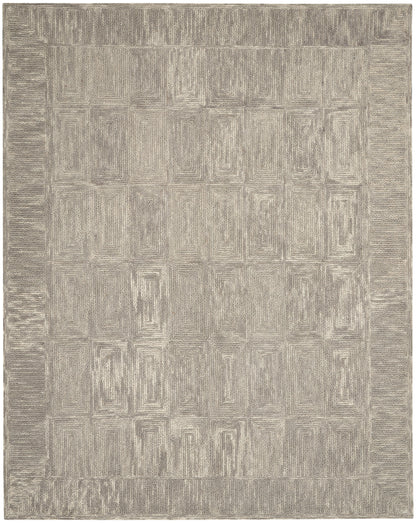 Neutral beige-gray rectangular area rug with a textured concentric rectangle pattern and wide border; modern geometric style.