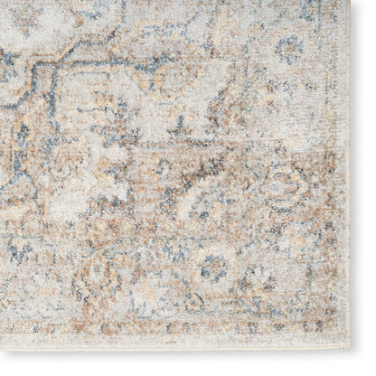Distressed cream and pale blue oriental-style area rug with vintage beige tones and faded floral motifs.