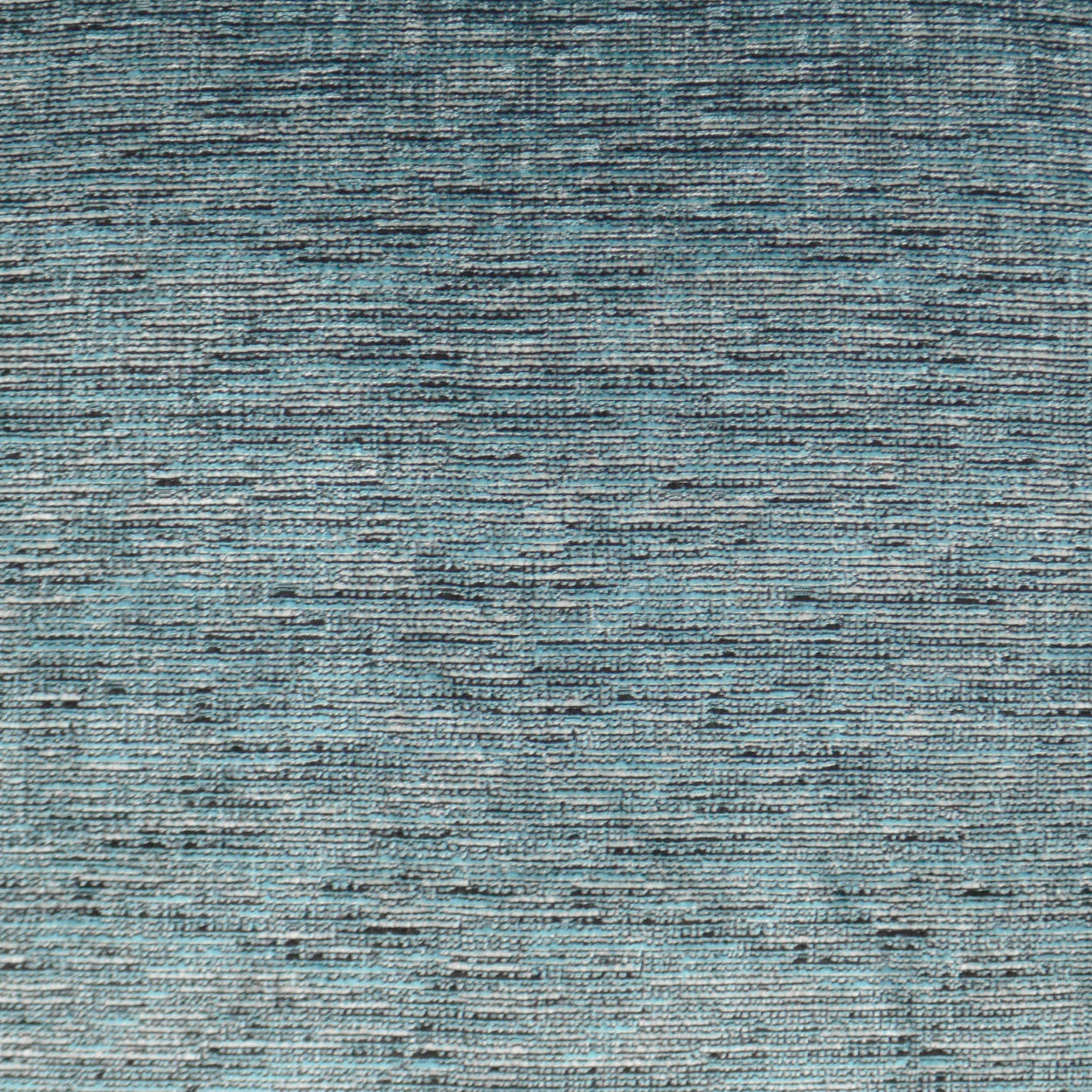 Blue woven rug with textured horizontal striped pattern in teal to navy tones.
