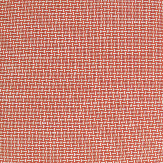 Rust-orange woven fabric with tiny white dash pattern; versatile upholstery textile.