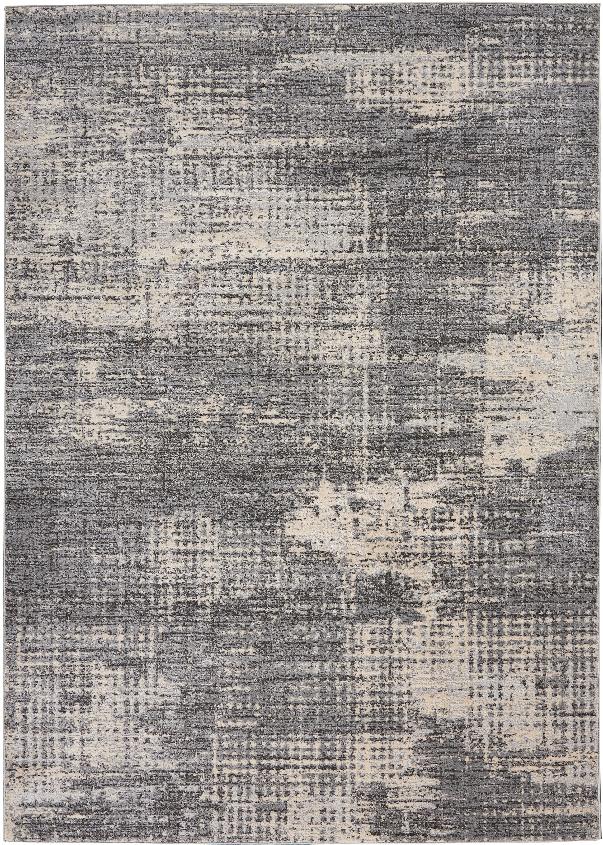 Abstract gray area rug with beige distressed pattern; modern rectangular, soft pile.