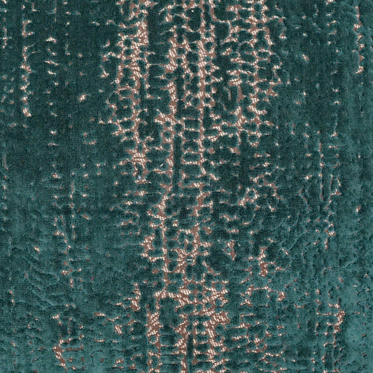 Teal velvet fabric with metallic gold-beige abstract pattern; luxe upholstery or drapery textile.
