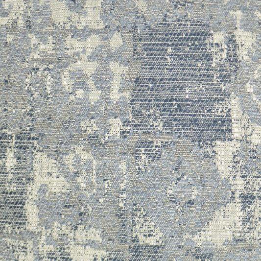 Blue and beige woven fabric with an abstract, snakeskin-inspired marbled pattern for upholstery.