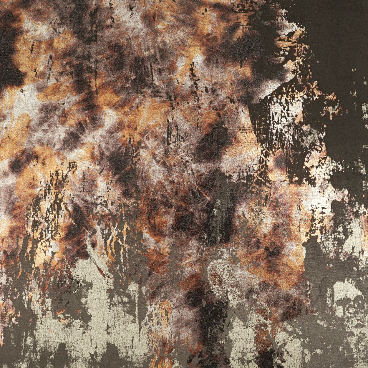 Abstract earthy-toned fabric in brown, tan, black and gray with a mottled, tie-dye-like texture.