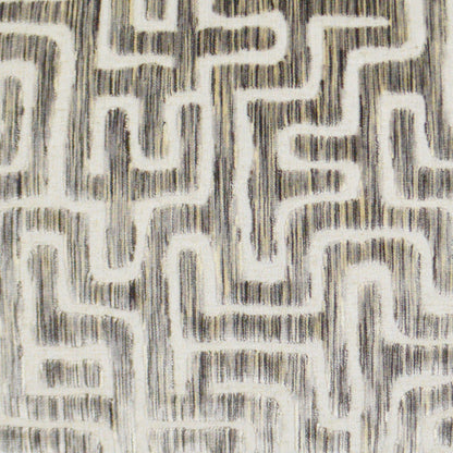 Beige pillow with a dark gray, maze-like geometric pattern and brushed texture.