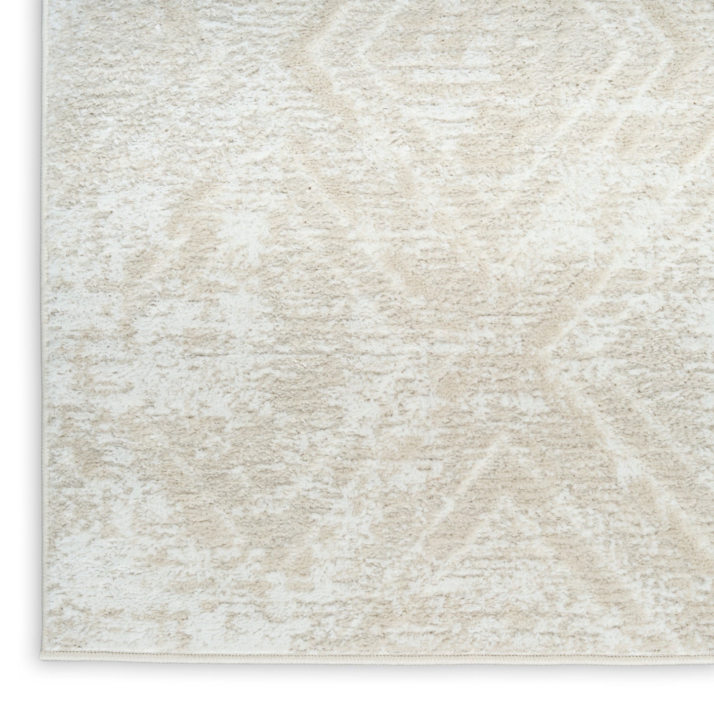 Cream beige textured area rug with subtle geometric diamond pattern and stitched border.