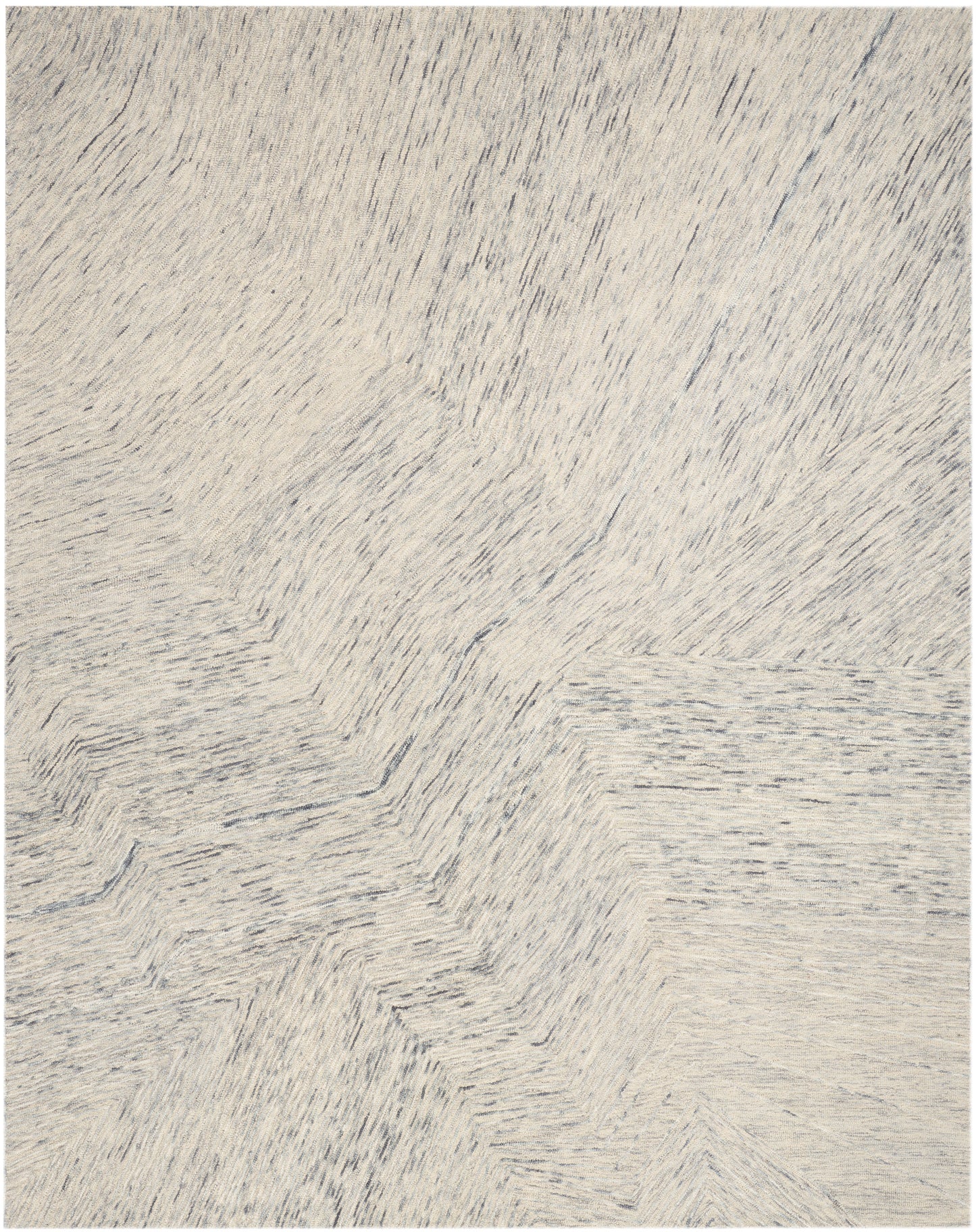 Cream shag rug with soft, subtly variegated gray fibers in a plush, textured pile for cozy living spaces.