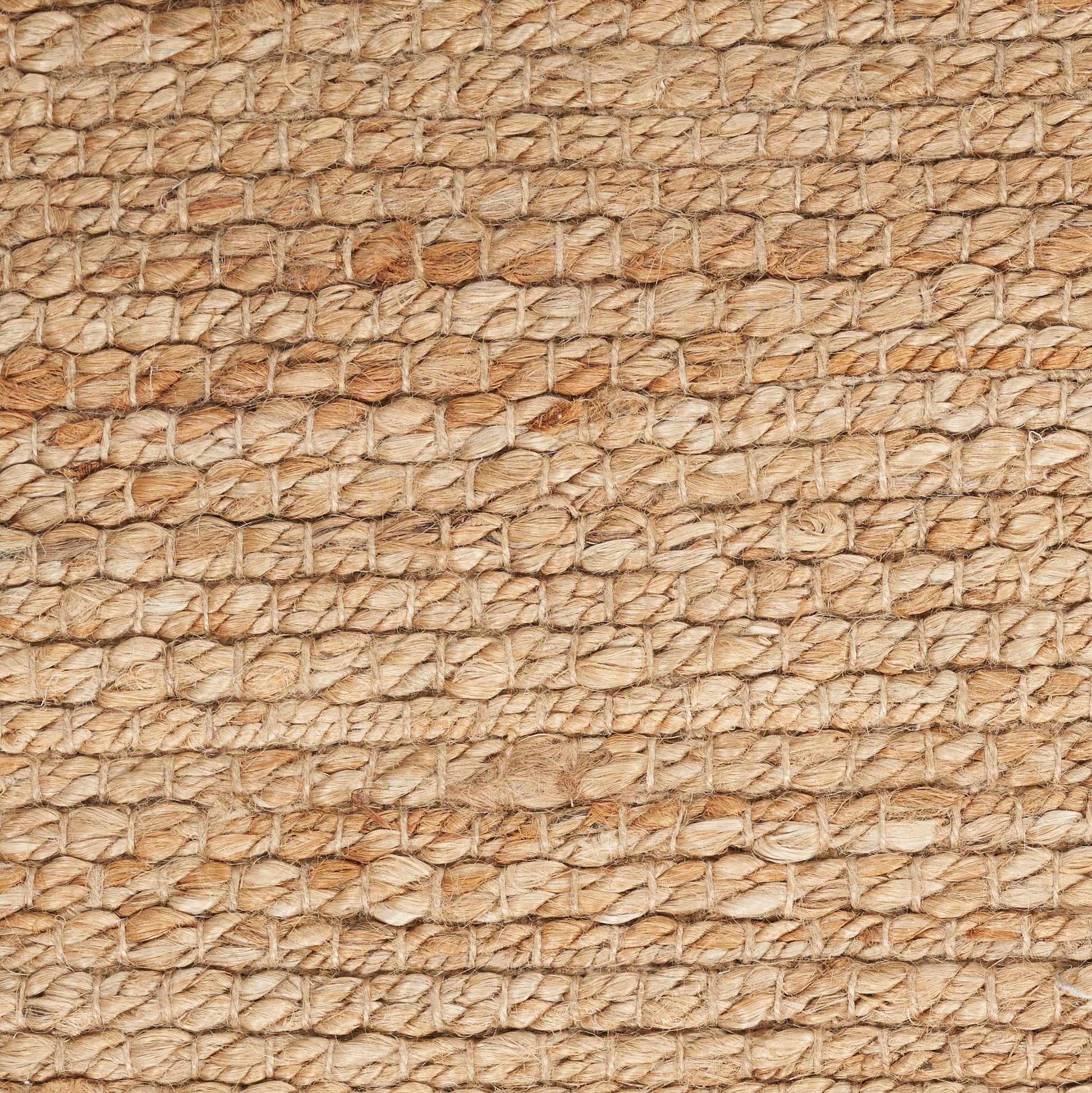Close-up of natural jute rope weave in beige tones with braided texture, farmhouse-style rug, 3' x 5'.