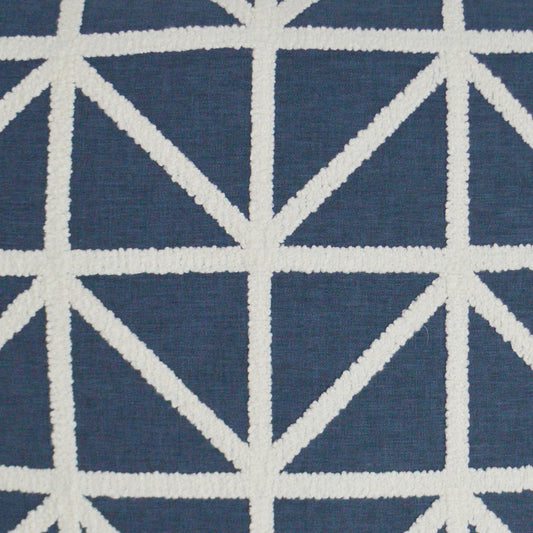 Navy blue fabric with bold white geometric lattice of intersecting lines forming triangles.