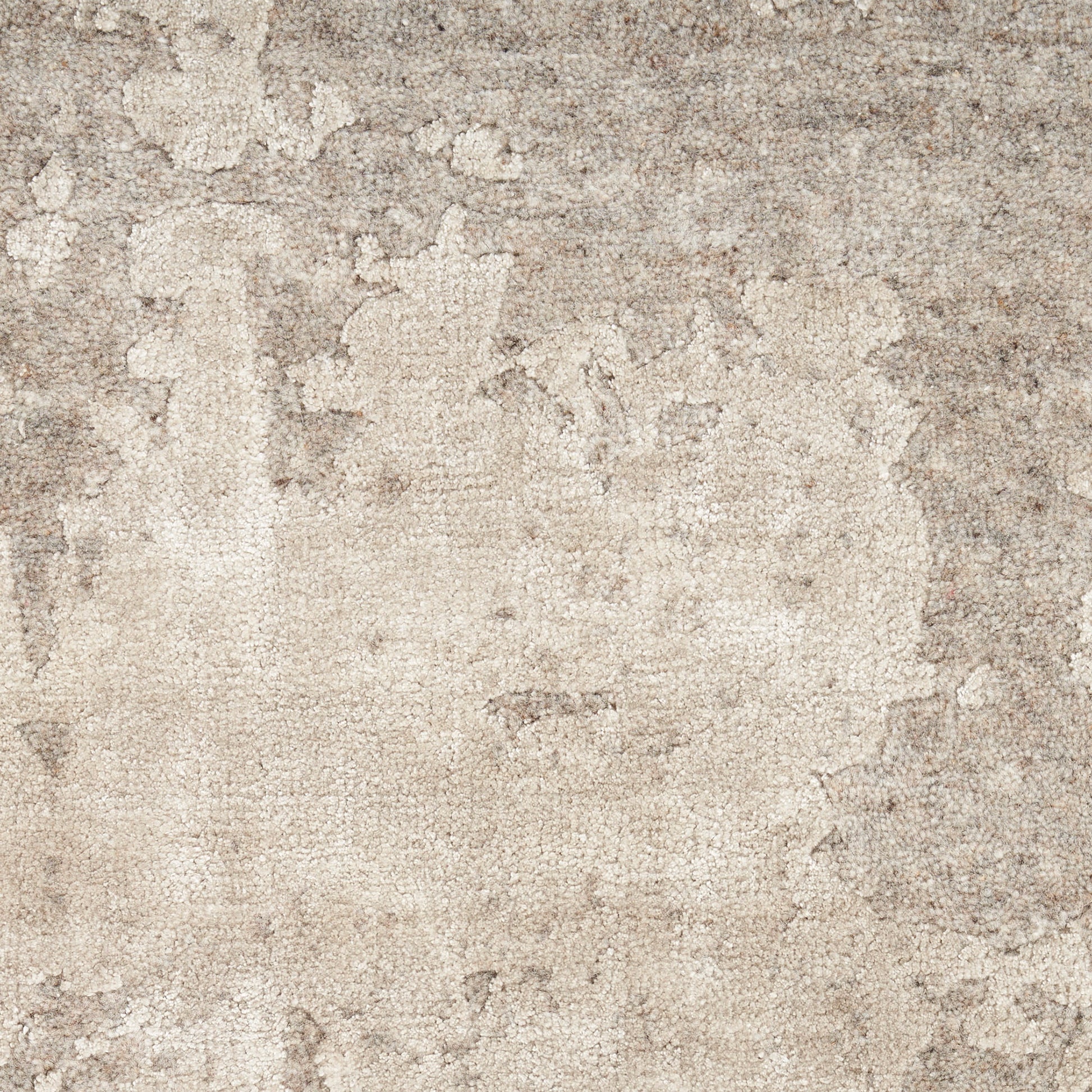 Beige, weathered concrete texture with aged plaster look and mottled, rough surface.