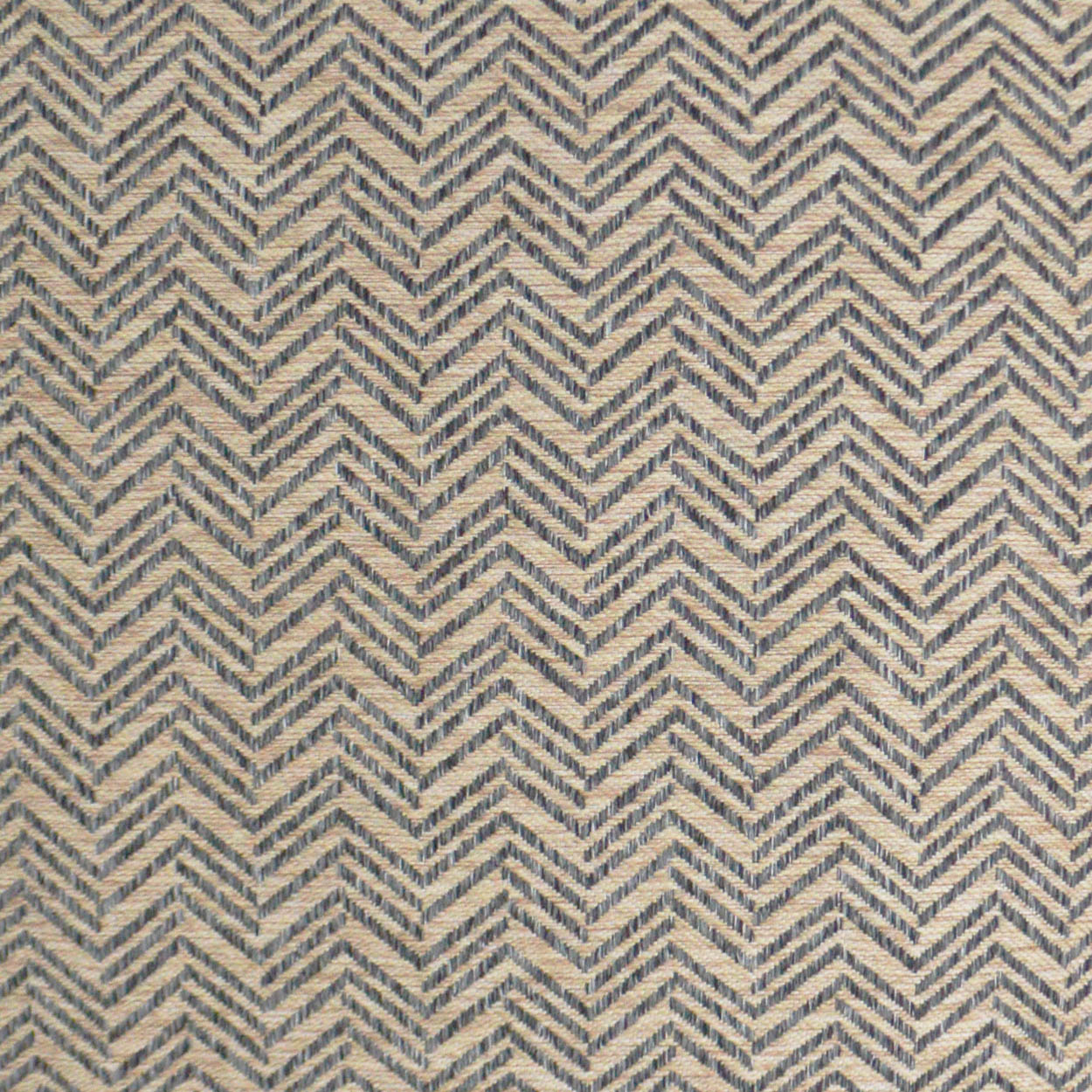 Beige & navy chevron-patterned woven fabric with herringbone-like zigzags; versatile for upholstery or crafts.
