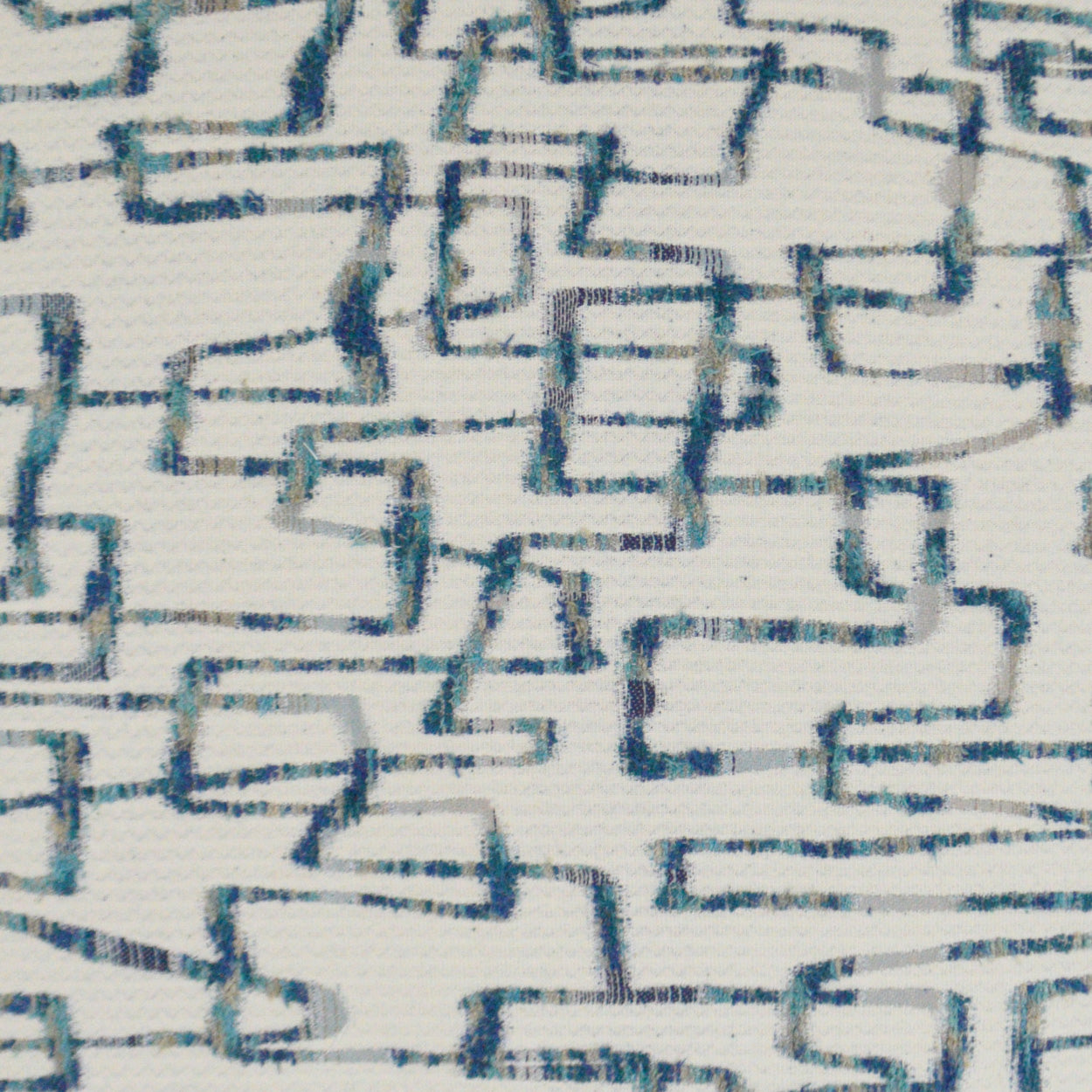Blue geometric interlocking rectangles on white fabric; modern textile for upholstery, curtains or pillows.
