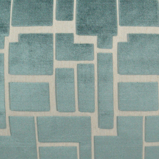 Teal-blue geometric fabric with a grid of rectangles and squares separated by light cream gaps.