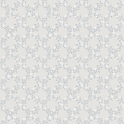 Beige wallpaper with pale blue-gray botanical lattice of vines and leaves; subtle vintage floral pattern.