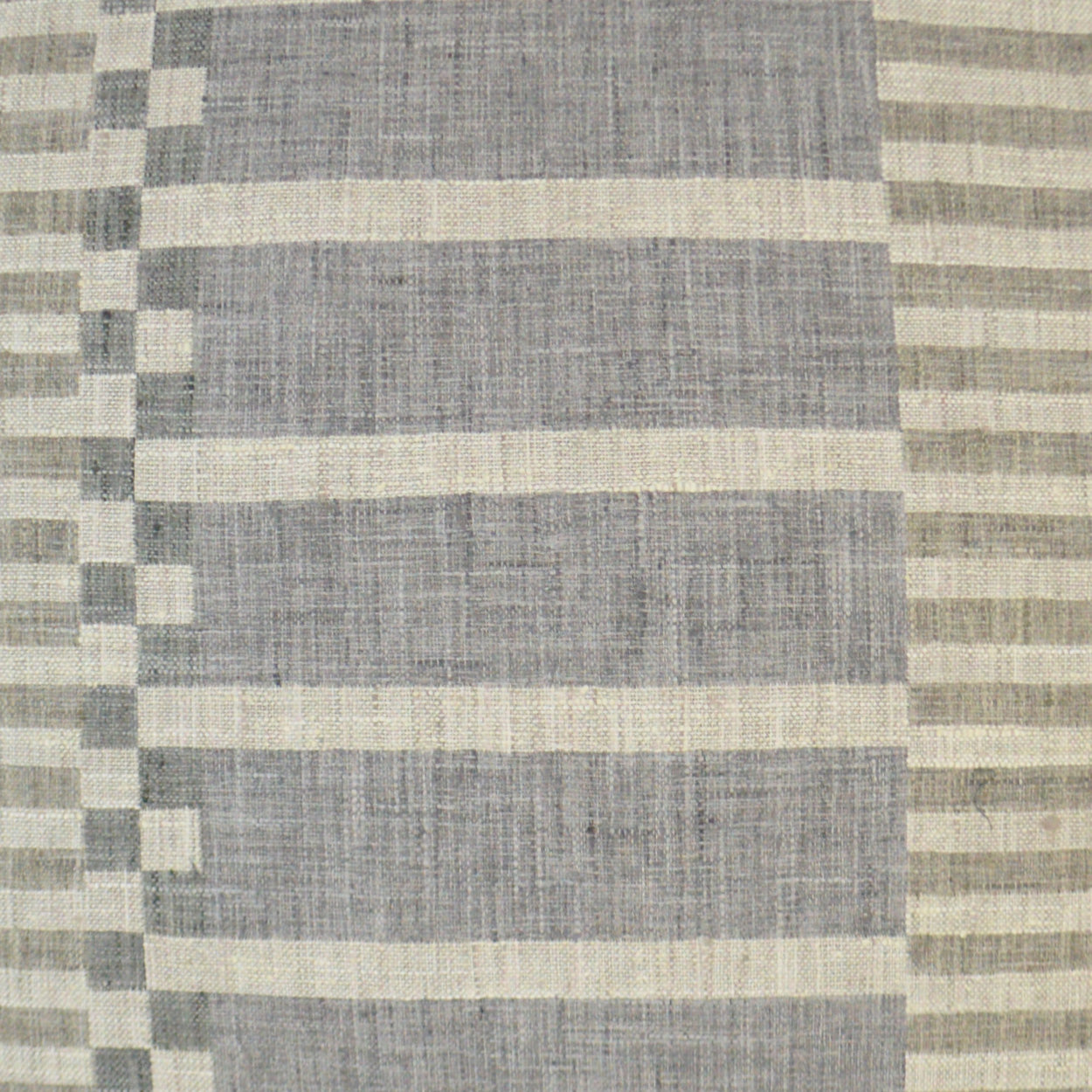Gray-blue and ivory striped woven fabric with visible texture for upholstery or throws.