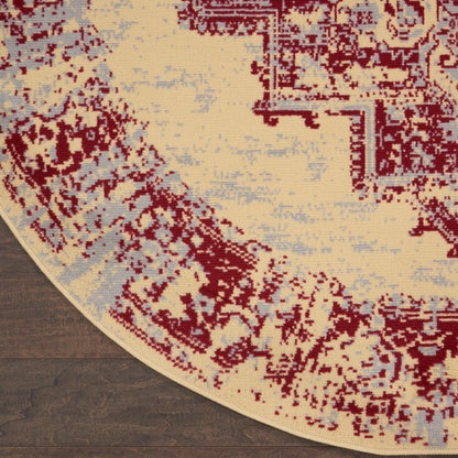 Round beige rug with burgundy and pale blue oriental pattern; woven textile, Persian-inspired living room accent.