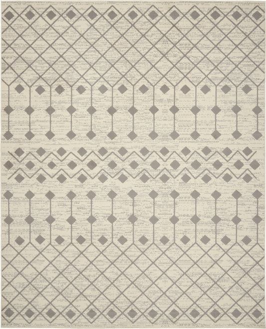 Beige area rug with taupe geometric diamond lattice and diamond-row motifs; modern chic.
