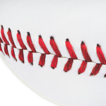 Close-up of white textured rug fibers, showing a soft plush surface.