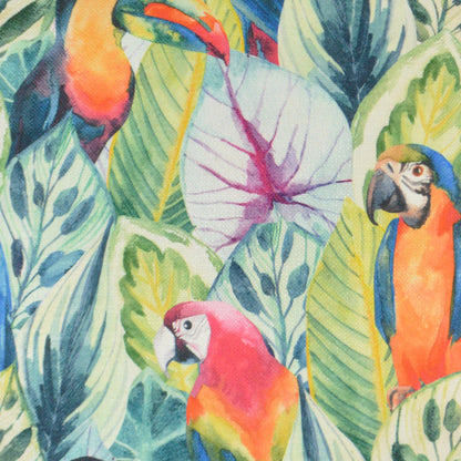 24" x 24" pillow featuring a bright tropical pattern of colorful macaws & large green leaves in a watercolor-style design.