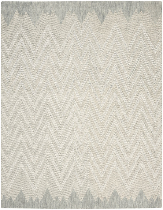 Rectangular woven rug with beige chevron zigzags and gray-blue borders at the top and bottom, soft, textured design.