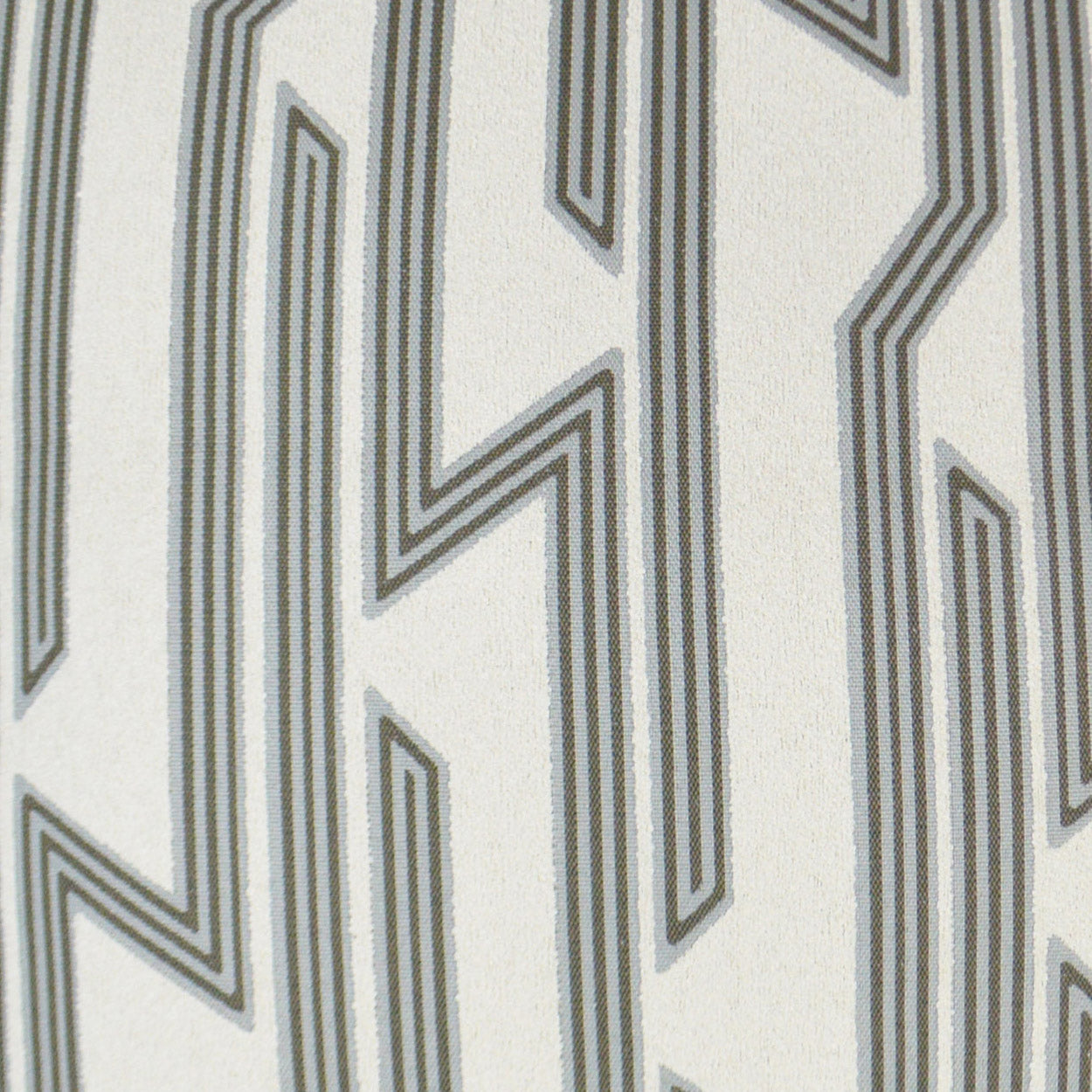 Light beige fabric with a grey geometric linear pattern of tall vertical, maze-like lines.