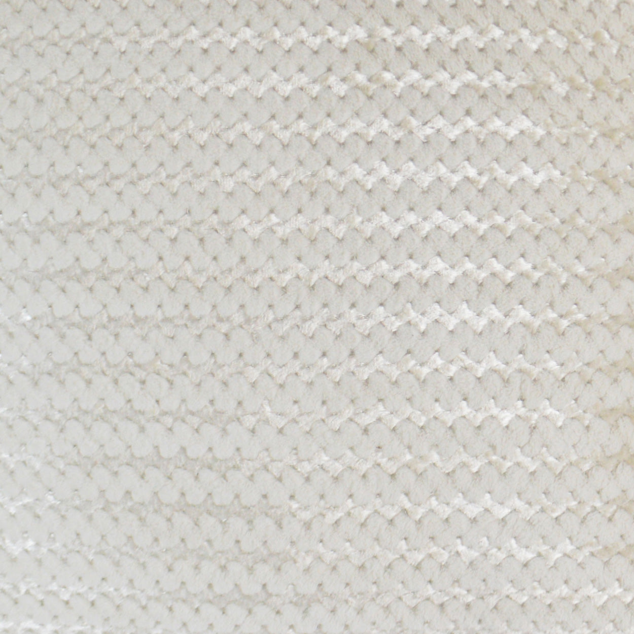 Cream textured knit fabric with subtle chevron zigzag pattern, soft and cozy.